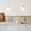 Apiales Vägglampa, Fast Installation | Brushed Brass/Opal